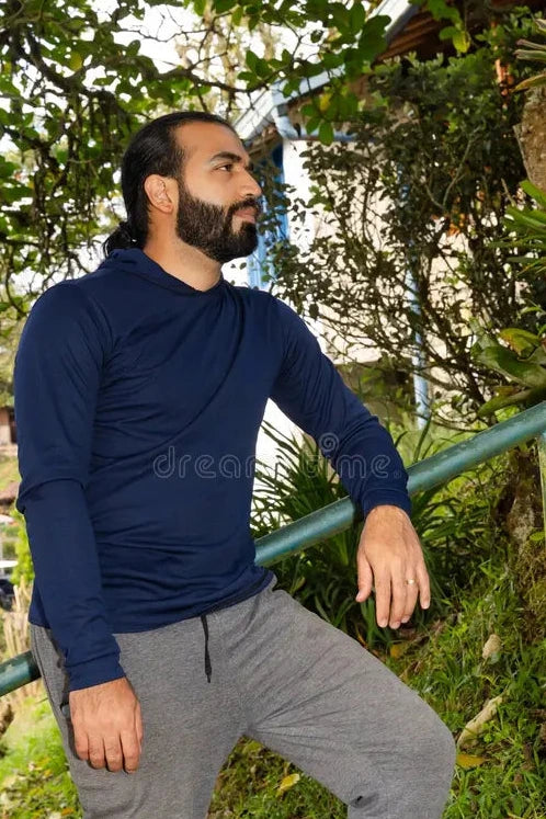 files/colombian-man-standing-grassy-slope-leaning-green-metal-railing-natural-outdoor-environment-colombian-man-standing-453491257.webp